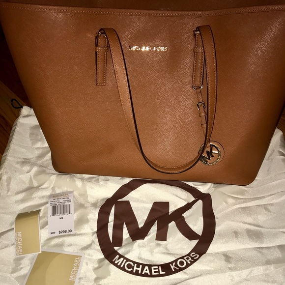 Michael Kors Handbags - Michael Kors Jetsetter travel tote w/ laptop pkt